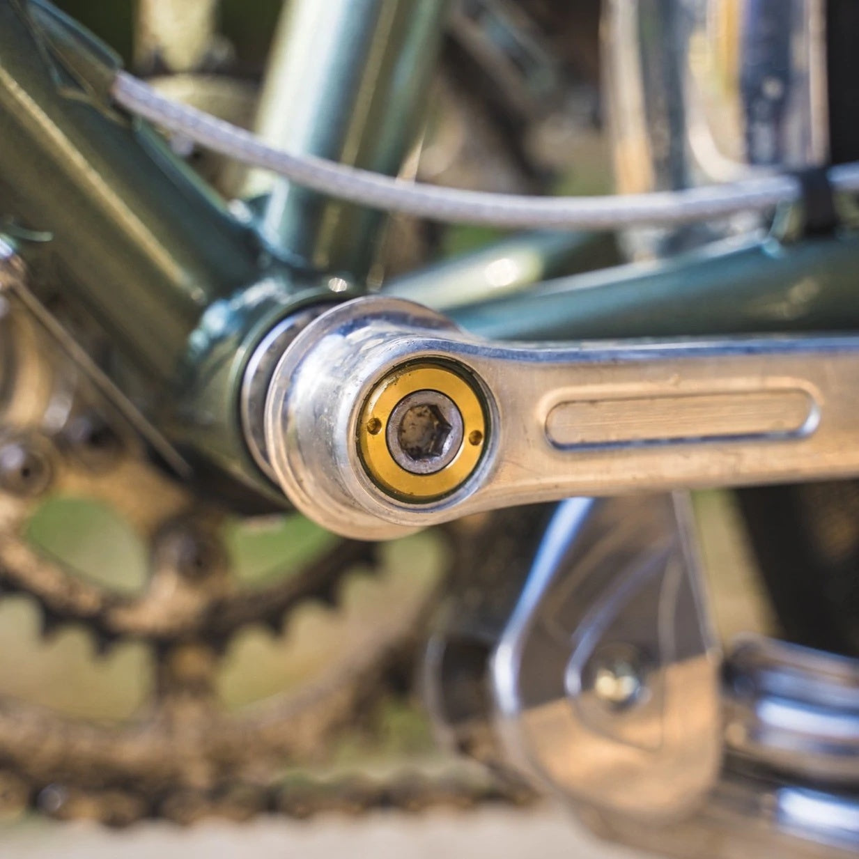 Blue Lug Brass Crank Cap